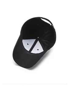 Detail showing the inner structure of a black baseball cap with white lining support