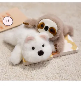 Close-up of plush capybara and sloth fridge magnets on a cozy textured carpet
