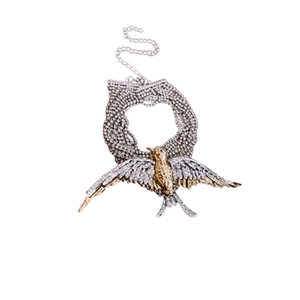 Sparkling rhinestone swallow pendant necklace with elegant layered silver and gold chain