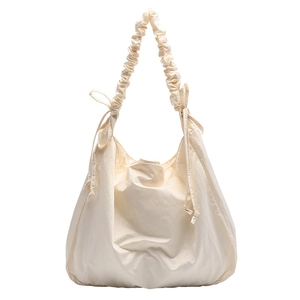 Minimalist beige drawstring nylon shoulder bag with stylish ruched straps for women