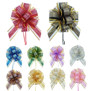 Set of ten colorful large gift pull bows with gold stripes for luxury gift wrapping