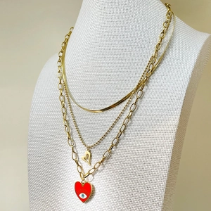 Ensemble de colliers superposés en acier doré avec pendentif cœur œil protecteur