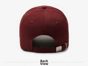 Detailed back view of a burgundy cotton baseball cap with adjustable metal buckle strap