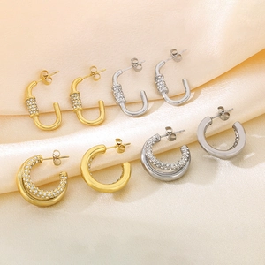Set of four pairs C-shaped and U-shaped rhinestone earrings in gold and silver finish