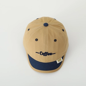 Top view of two-tone khaki and navy blue kids baseball cap with coffee embroidery