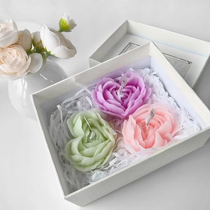 Three heart-shaped rose scented candles in pink purple and green gift box set