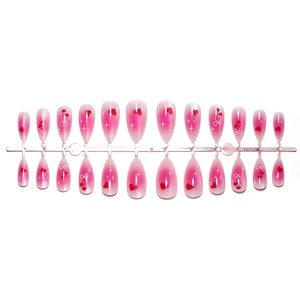 Pink cat eye press-on nails with red hearts and white bows for Valentine gift