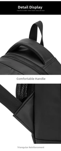 Detail view of reinforced stitching, breathable mesh straps and durable handle on black backpack