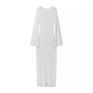 Detail view of white crochet beach dress with deep V-neck and stylish flared sleeves