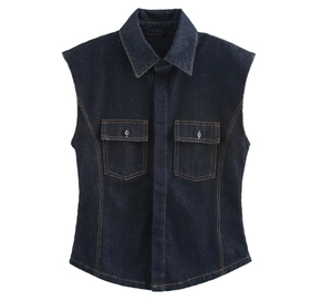 Detail of dark blue denim vest with lapel collar and two buttoned chest pockets