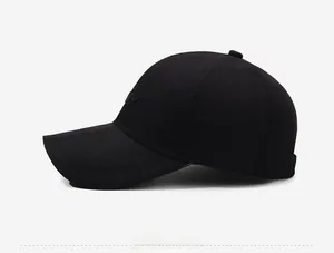 Side view of black cotton baseball cap with curved brim and detailed six-panel design