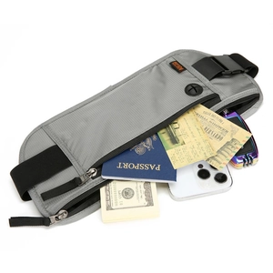 Gray RFID blocking running waist pack with multiple zip compartments for travel items