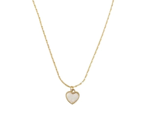 Detailed view of the gold heart pendant with white shell inlay and beaded edge design