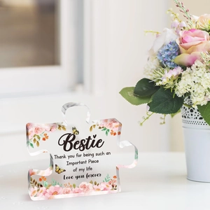 Detail of acrylic puzzle plaque with floral design and Bestie friendship quote