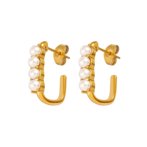 Elegant gold U-shaped stainless steel earrings with four white pearls on white background