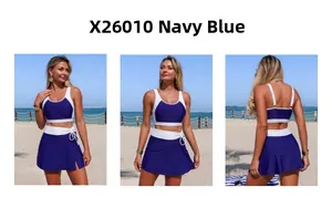 Three views of navy blue two-piece sporty swimsuit with white trim and side-slit swim skirt