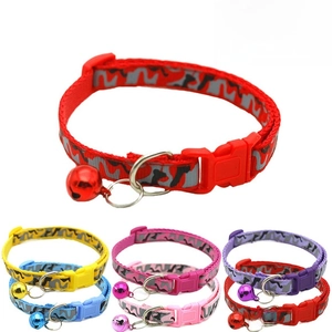 Detail of adjustable camouflage pet collars with quick-release buckles and bells for cats