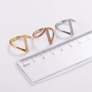 Classic V-shaped minimalist diamond rings in gold rose gold and silver finishes