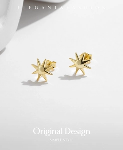 Detail of S925 sterling silver sunburst earrings with elegant gold-plated finish