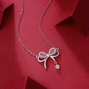 S925 Sterling Silver Bowknot Necklace with Tassel Pendant and Zirconia Accents