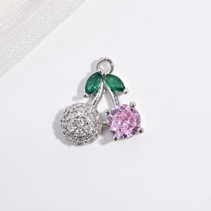 Detail of silver cherry pendant with pink crystal and green marquise leaf stones