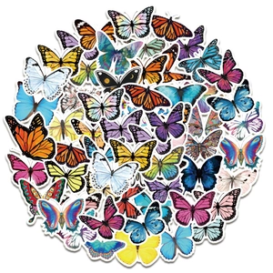 Macro detail of various colorful PVC butterfly stickers for laptop and DIY decoration