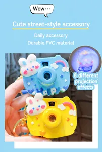 Close-up of cute rabbit projection camera keychain with LED light effect