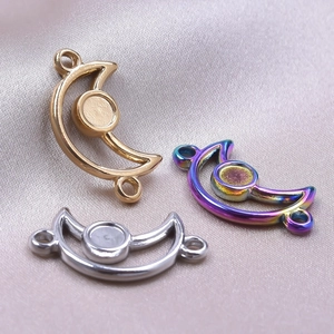 Three crescent moon DIY jewelry connectors in gold, silver and rainbow plated steel