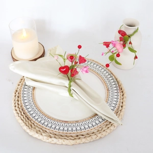 Pink heart artificial flower napkin ring on cream cloth for wedding table decor