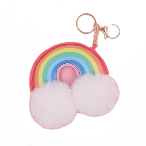Rainbow plush keychain with white pom-poms and gold ring on a white background