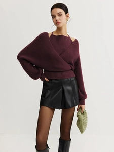 Detail view of burgundy two-piece knitwear set with matching shorts and hosiery