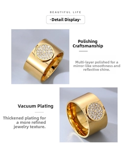 Macro view of wide gold-plated ring showing polished finish and sparkling zircon inlay