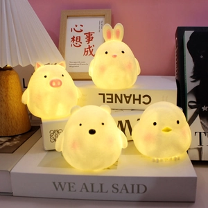 Cute cartoon animal night lights featuring rabbit and bear shapes with warm yellow glow