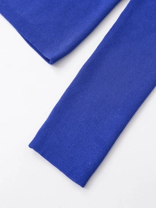 Close-up of royal blue knitted rib cuff detail showing elastic vertical textures
