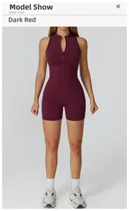 Close-up of deep red sports bodysuit featuring a zipper collar and high-stretch fabric