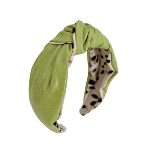 Green faux leather knotted headband with stylish leopard print lining for women