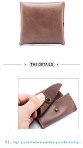 Close-up of brown genuine leather coin purse with vintage square design and metal snap button