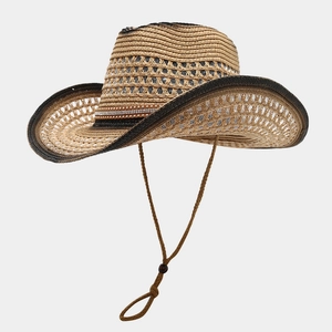 Close-up of woven straw cowboy hat featuring crystal studded band and adjustable chin cord