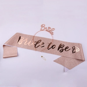 Detail of rose gold Bride headband and glitter Bride to Be sash for 30th birthday parties