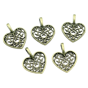 Set of five vintage bronze alloy heart pendants with intricate filigree openwork design
