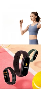 Detail showing M7 fitness tracker in black, purple, and green with OLED heart rate monitor