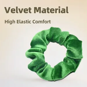 Green velvet scrunchie with high elasticity and comfortable ribbed texture for hair