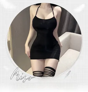 Close-up of black backless halter nightdress with glossy fabric and mini-length cut