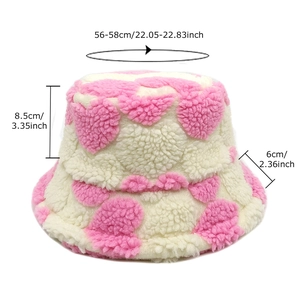 Winter faux fur bucket hat with pink hearts pattern and specific size dimensions shown