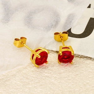 Detailed view of red cubic zirconia stud earrings with classic 4-prong gold plating