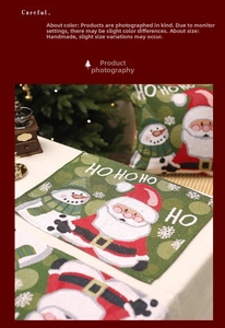 Detailed view of green Christmas placemat and matching cushion with festive Santa patterns