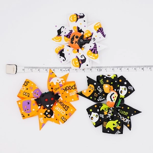 Three Halloween themed grosgrain ribbon hair bows with pumpkin, ghost and bat patterns