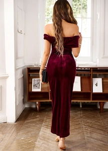 Elegant back view of long burgundy velvet off-shoulder dress with a refined silhouette