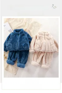 Detail of plush thermal children's loungewear set with soft fleece texture and zipper