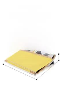 Flat folded view of breathable yellow pet carrier bag showing compact dimensions